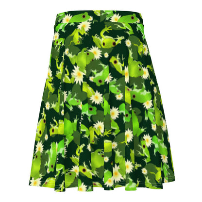 Kero-kero kawaii skater skirt in green with frogs mid-jump and pale water lilies