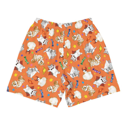 Trick or Treaters alternative men's athletic shorts in pumpkin orange with mummy puppies and wrapped candy