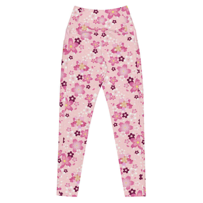 Sakura kawaii premium leggings in pink with pale pink blossoms and scattered petals