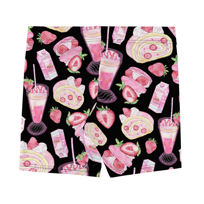 Pink kawaii Strawberry shorts with whipped cream swirls and macarons